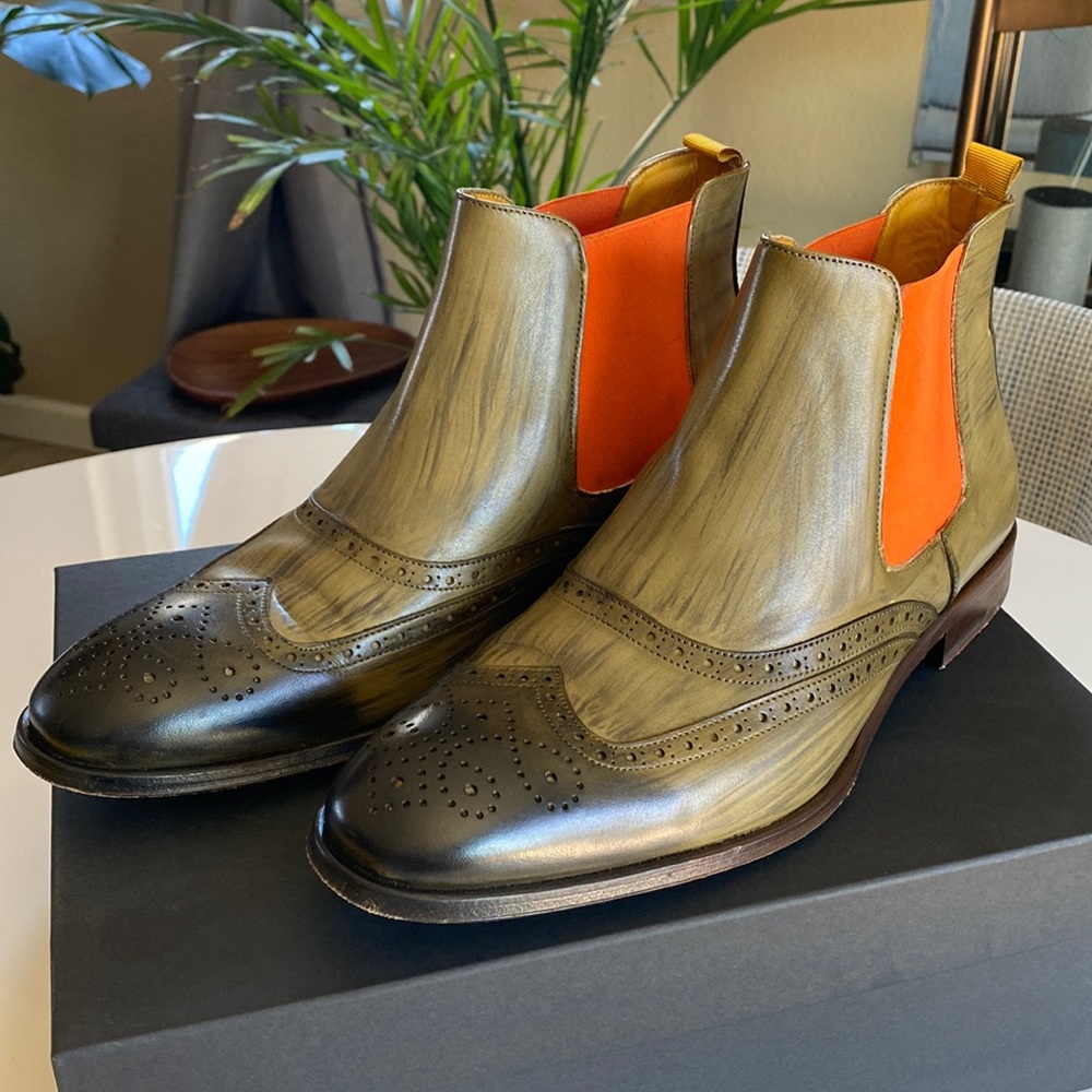 Mens Leather Chelsea Boot, full brogue wingtip. Leather sole with orange elastic